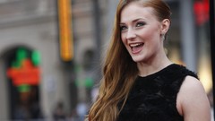 Woman Actress smiling blue eyes black dress open mouth redheads 