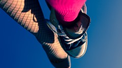 Woman air legs snickers pink clothing.