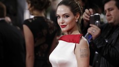 Woman Angelina Jolie red carpet Golden Globes Award Statues
