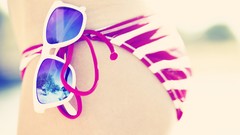 Woman ass sunglasses bikini bottom