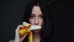 Woman bananas faces blue eyes brunettes models Zsanett Tormay