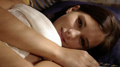 Woman beds smiling Monika