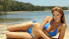 Woman bikini sand Emily