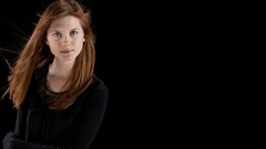 Woman black background Bonnie Wright redheads