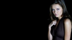 Woman black background German blue eyes brunettes black shirt 