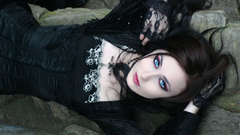 Woman black blue eyes