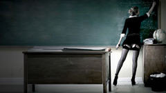 Woman blackboards mathematics teachers