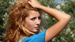 Woman blondes long hair blurred background girls in nature 
