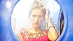 Woman blondes models washing machine