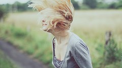 Woman blondes short hair blowing hair