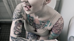 Woman blondes tattoos piercings toilet paper