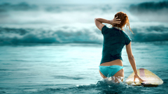 Woman blue bikini waves