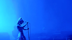 Woman blue microphones Under