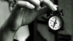 Woman blurred background alarm clocks