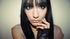 Woman brown eyes bangs black hair Lexi Grace