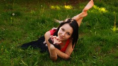 Woman brunettes models legs up laying on stomach girls in 