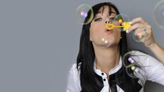 Woman bubbles katy perry singers blowing bubbles