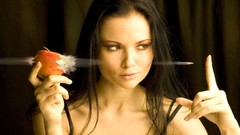 Woman bullets apples projectiles