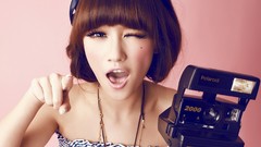 Woman Cameras asians brunettes short hair bangs wink polaroid