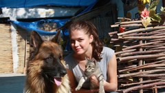 Woman cats Dogs jeans sitting t-shirts outdoors long hair blue 