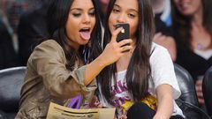 Woman Celebrity Actress vanessa hudgens brunettes licking 