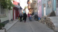 Woman children street Bicycles walk cities turkish narrow road 