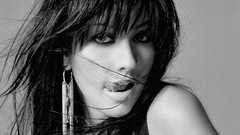 Woman Christina Aguilera monochrome licking lips