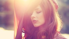 Woman close-up Eyes Wide Shut long hair