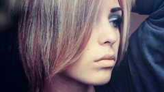 Woman close-up faces green eyes Lana Branishti