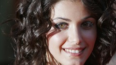 Woman close-up faces outdoors smiling long hair brown eyes 