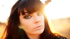 Woman close-up faces sunlight brunettes piercings Taylor 