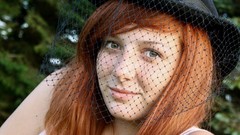 Woman close-up hats faces veils freckles redheads
