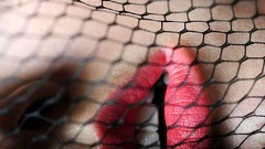 Woman close-up lips fashion veil netting