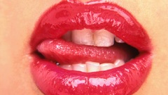 Woman close-up lips tongue