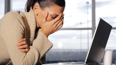 Woman cups Laptops closed