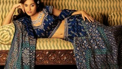 Woman dress stomach Actress couch brunettes indian lying down 