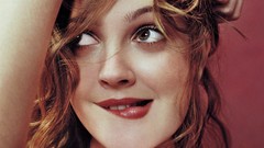 Woman Drew Barrymore red background faces Actress curly hair 
