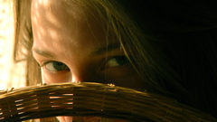 Woman eyes Met-Art magazine