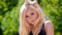 Woman faces blondes bowtie Katrin Reda