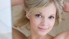 Woman faces blondes models arms raised Feeona A