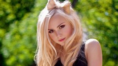 Woman faces blondes smiling bowtie Katrin Reda