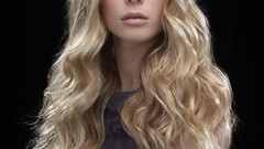 Woman faces blondes wand