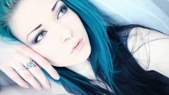 Woman faces blue hair lying down TwiggX looking away