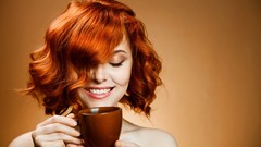 Woman faces cups redheads stock photo