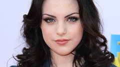 Woman faces Elizabeth Gillies