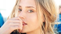 Woman faces Estella Warren