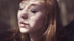 Woman faces smiling closed eyes Paula Bendowska