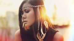 Woman feathers asians sunlight closed eyes brunettes artistic 