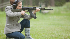 Woman girls with guns