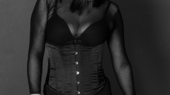 Woman gloves whip skirts corset mistress standing dominant 